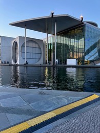 Berlin, Germany - July 30, 2024: Picturesque view of Marie-Elisabeth-Luders-Haus near river outdoors