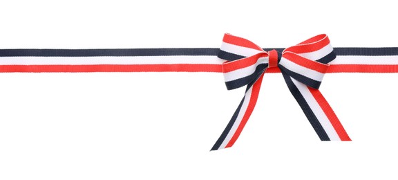 Photo of Ribbon with bow in colors of Yemeni flag isolated on white, top view