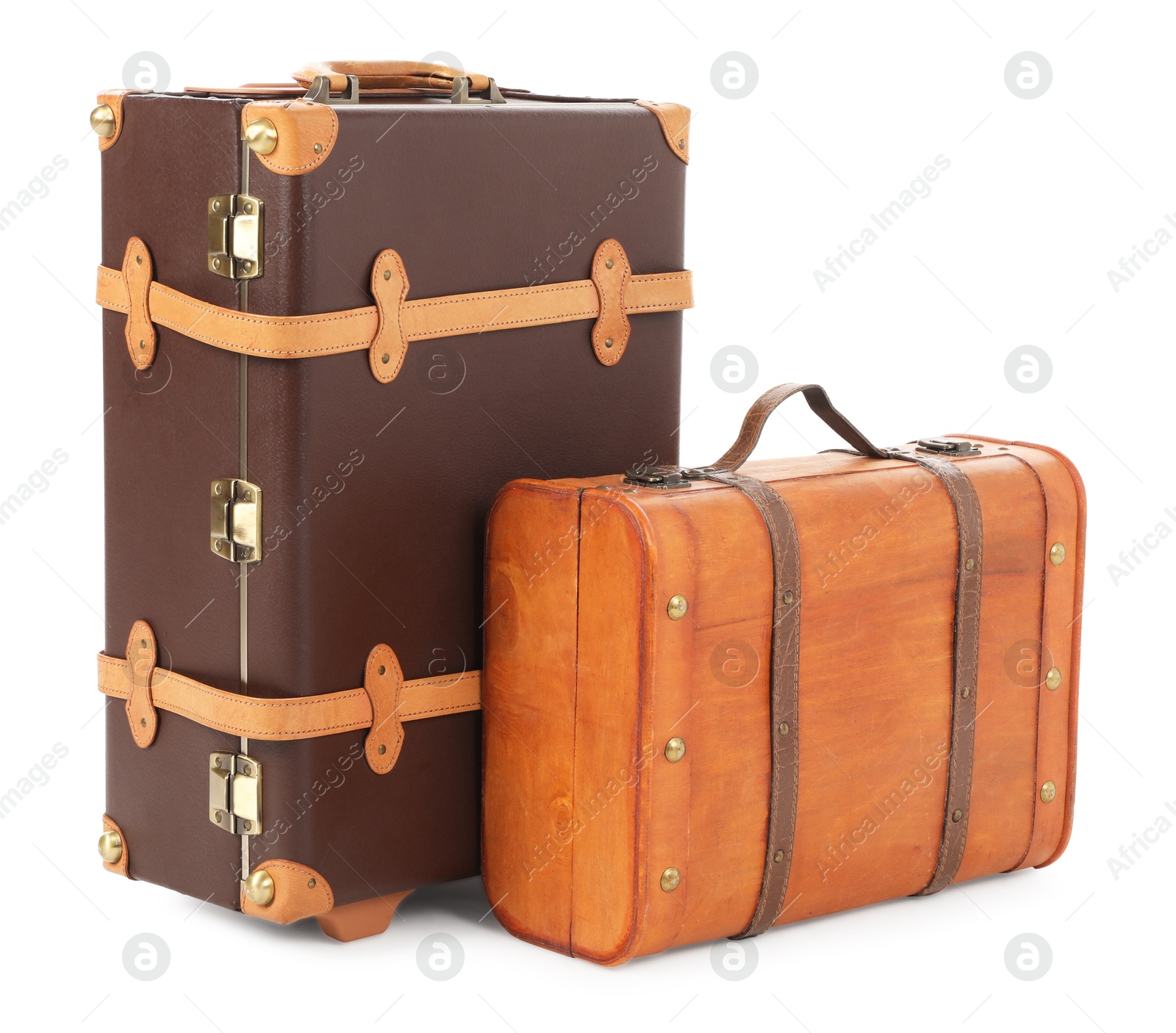 Photo of Two new brown suitcases isolated on white