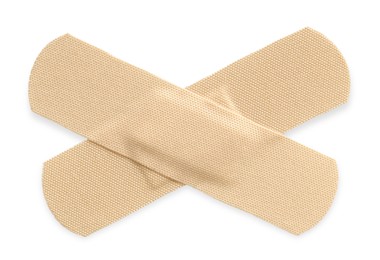 Photo of Medical adhesive bandages isolated on white, top view