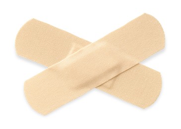 Photo of Medical adhesive bandages isolated on white, top view