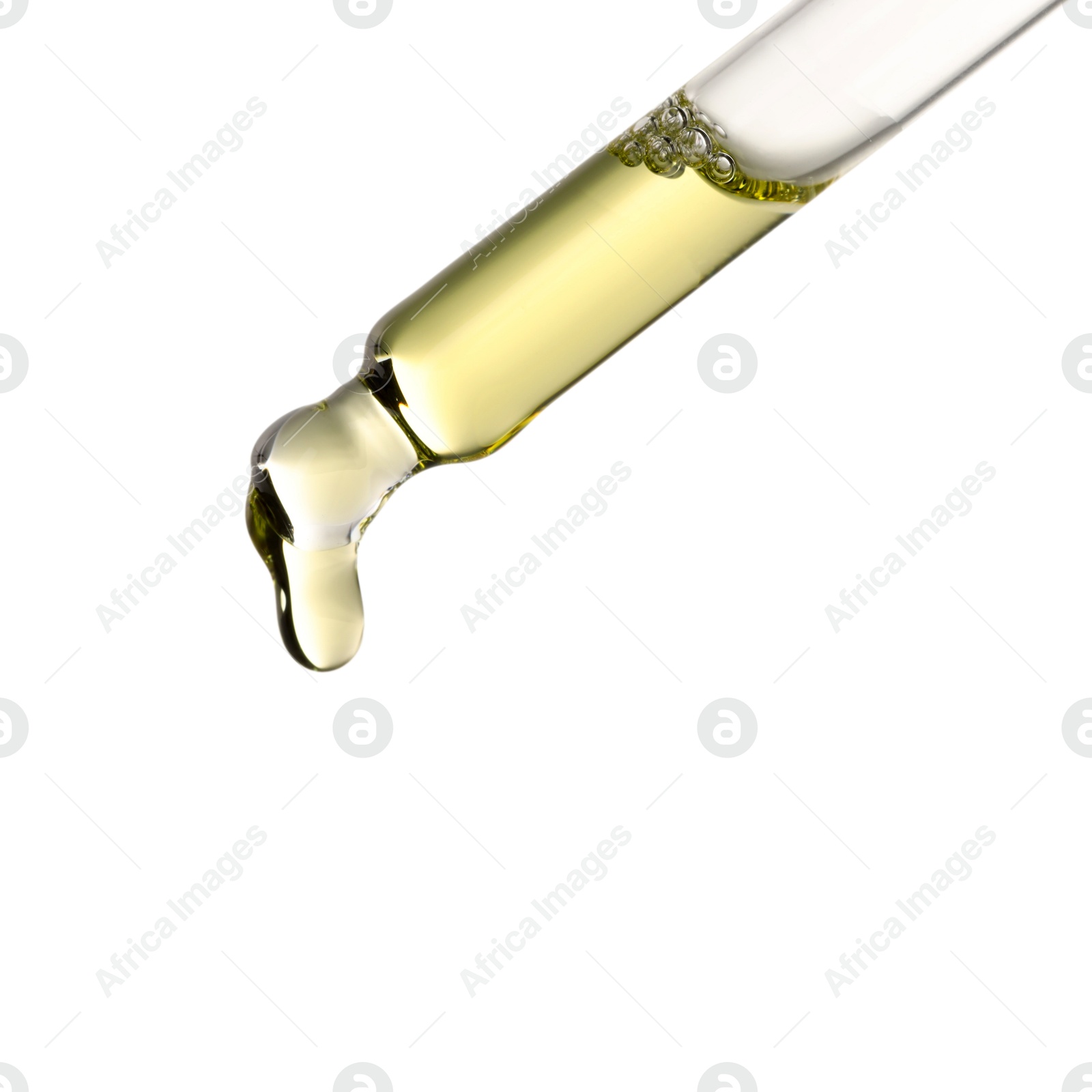 Photo of Essential oil dripping from pipette against white background