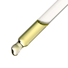 Photo of Essential oil dripping from pipette against white background