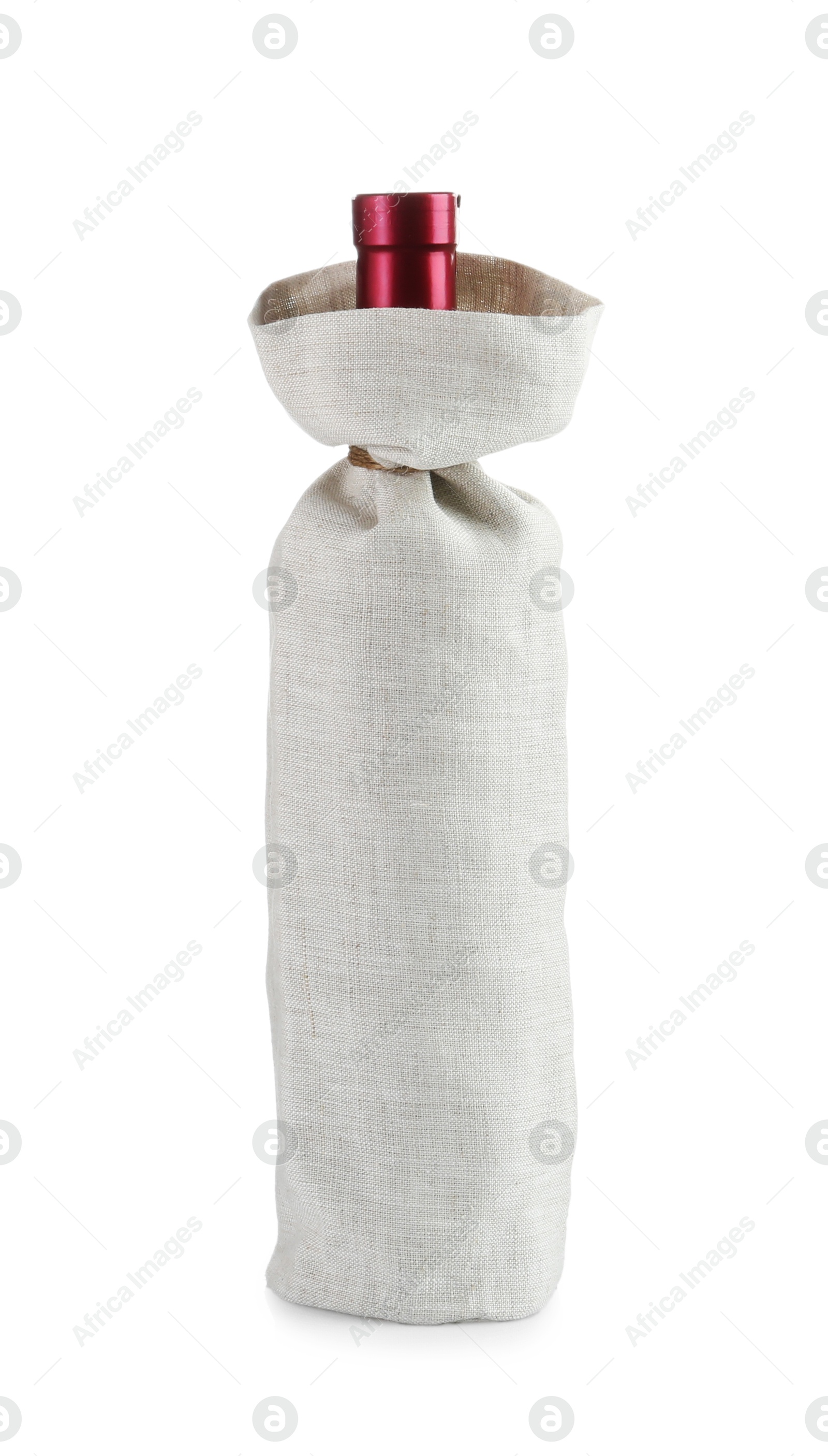 Photo of Wine bottle in burlap package isolated on white