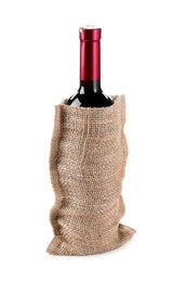 Wine bottle in burlap bag isolated on white