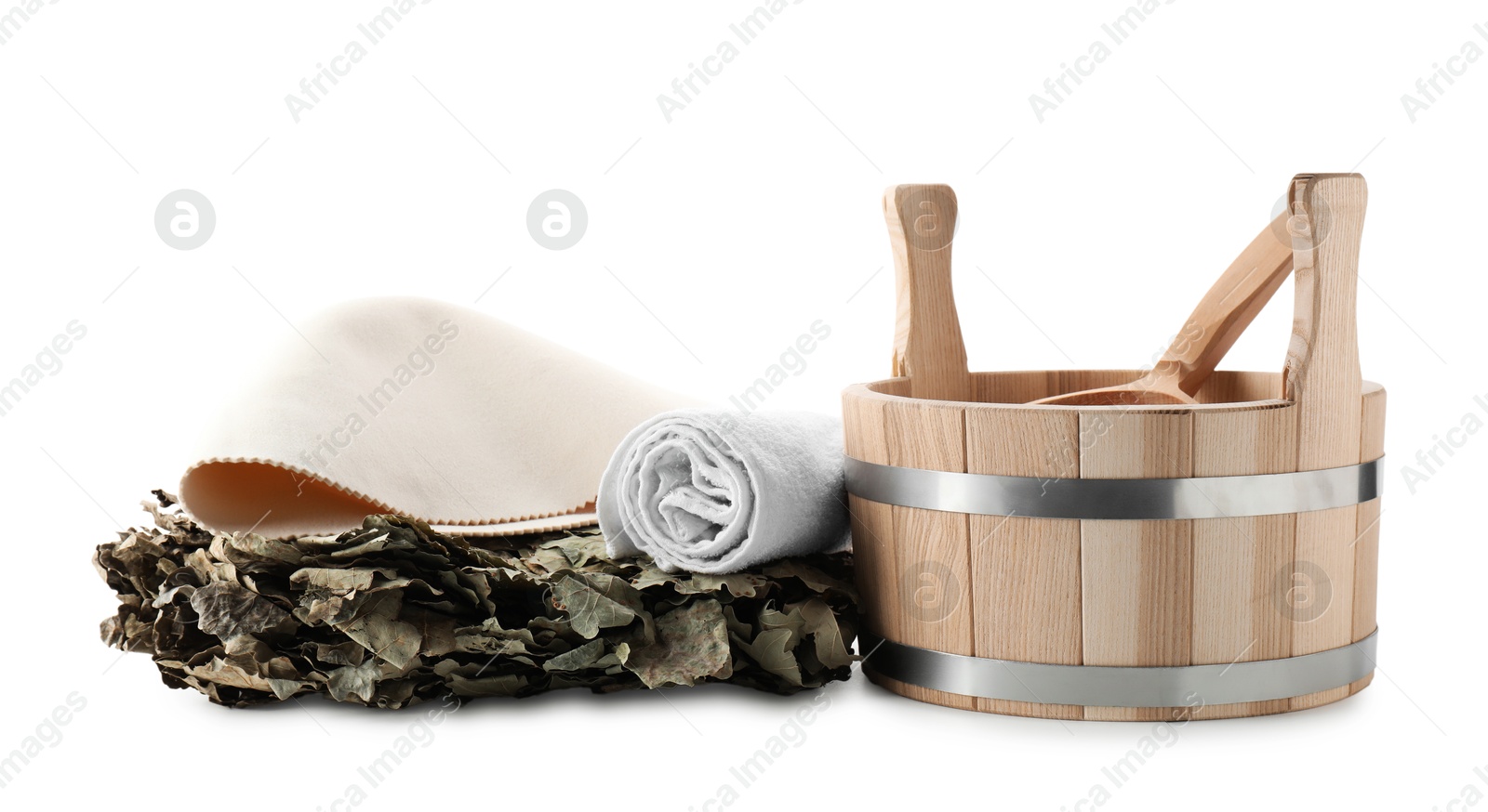 Photo of Sauna equipment. Wooden bucket with ladle, felt wool hat, oak whisk and towel isolated on white