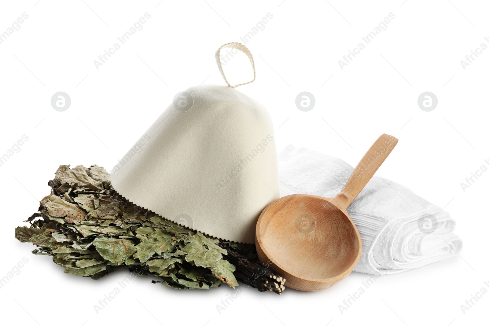 Photo of Sauna equipment. Felt wool hat, oak whisk, wooden ladle and towel isolated on white