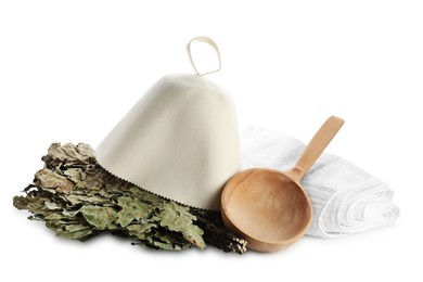 Photo of Sauna equipment. Felt wool hat, oak whisk, wooden ladle and towel isolated on white