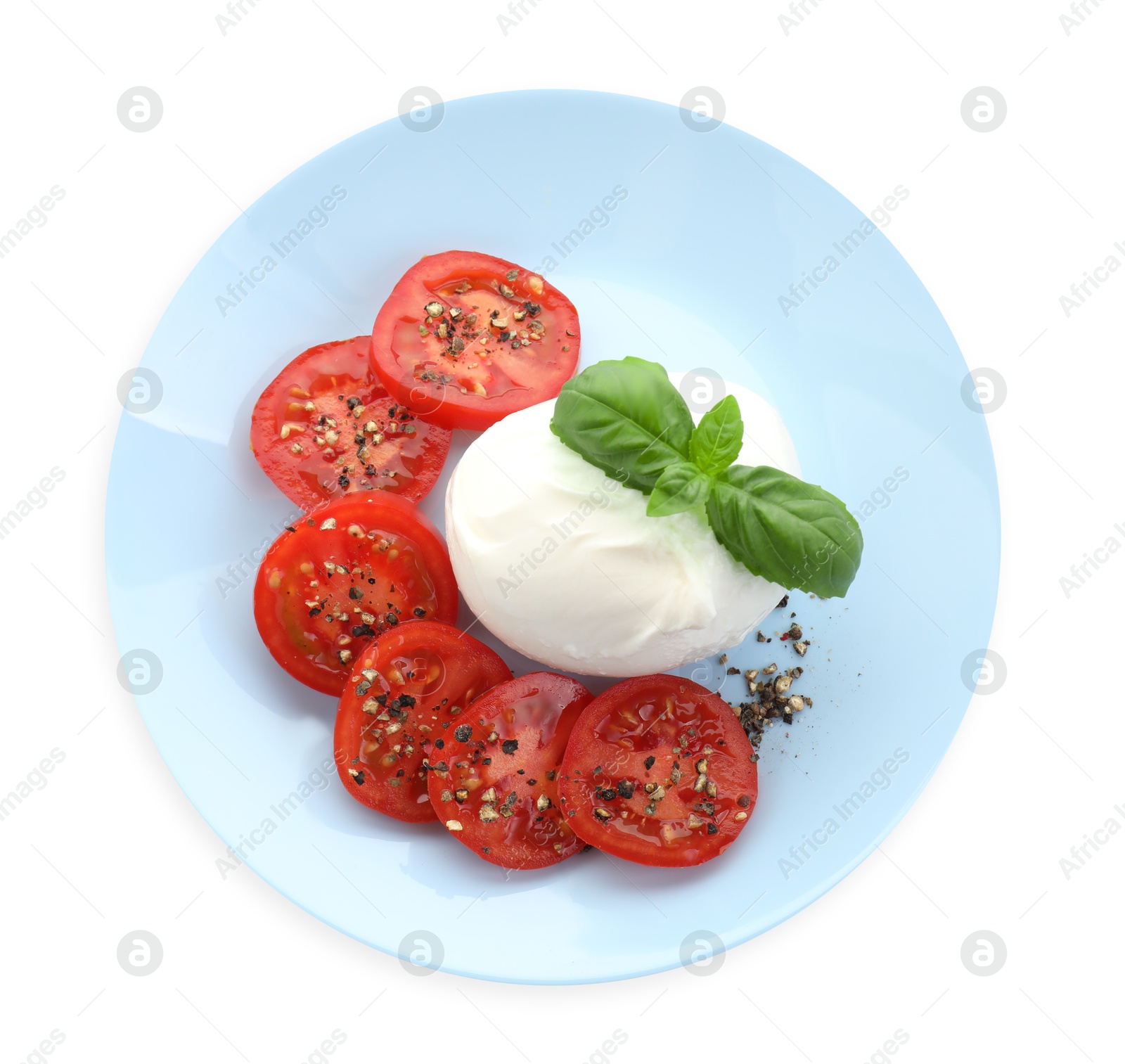 Photo of Delicious burrata cheese, tomatoes, basil and spices isolated on white, top view