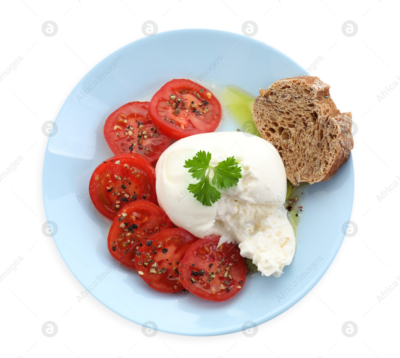 Photo of Delicious burrata cheese, tomatoes, parsley and bread isolated on white, top view