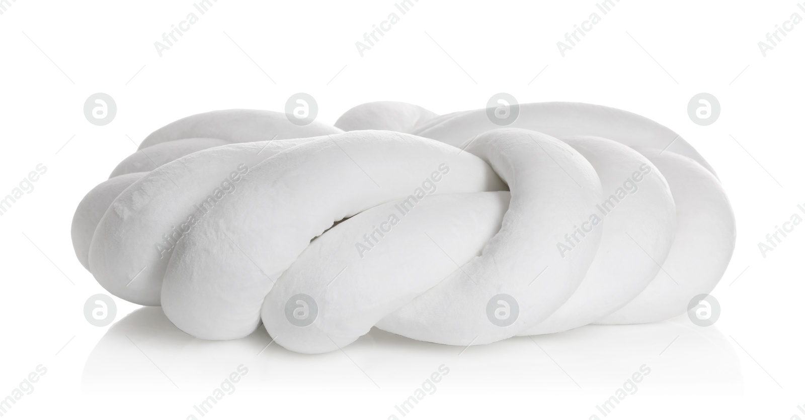 Photo of Cushion in shape of knot isolated on white