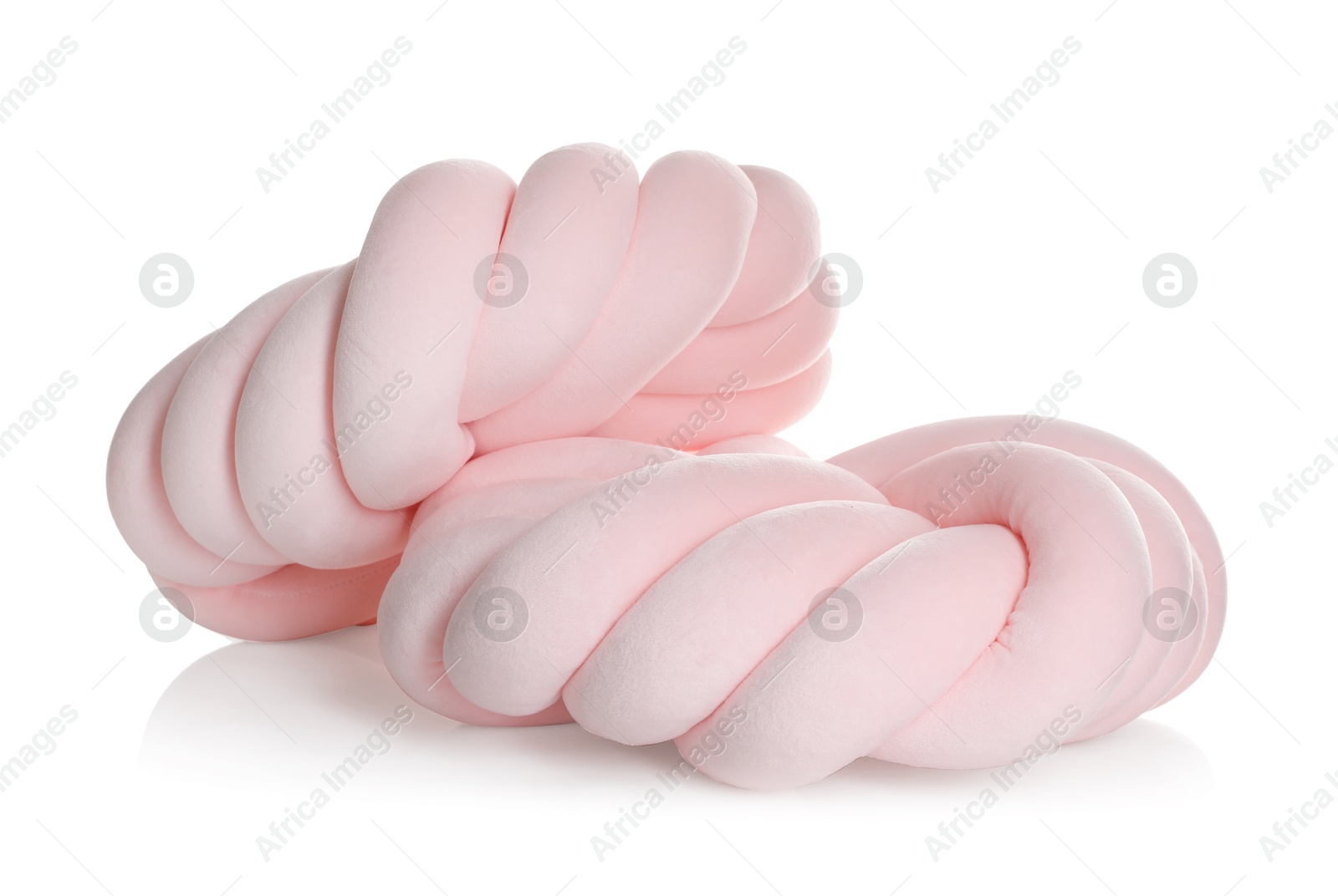 Photo of Pink cushions in shape of knot isolated on white