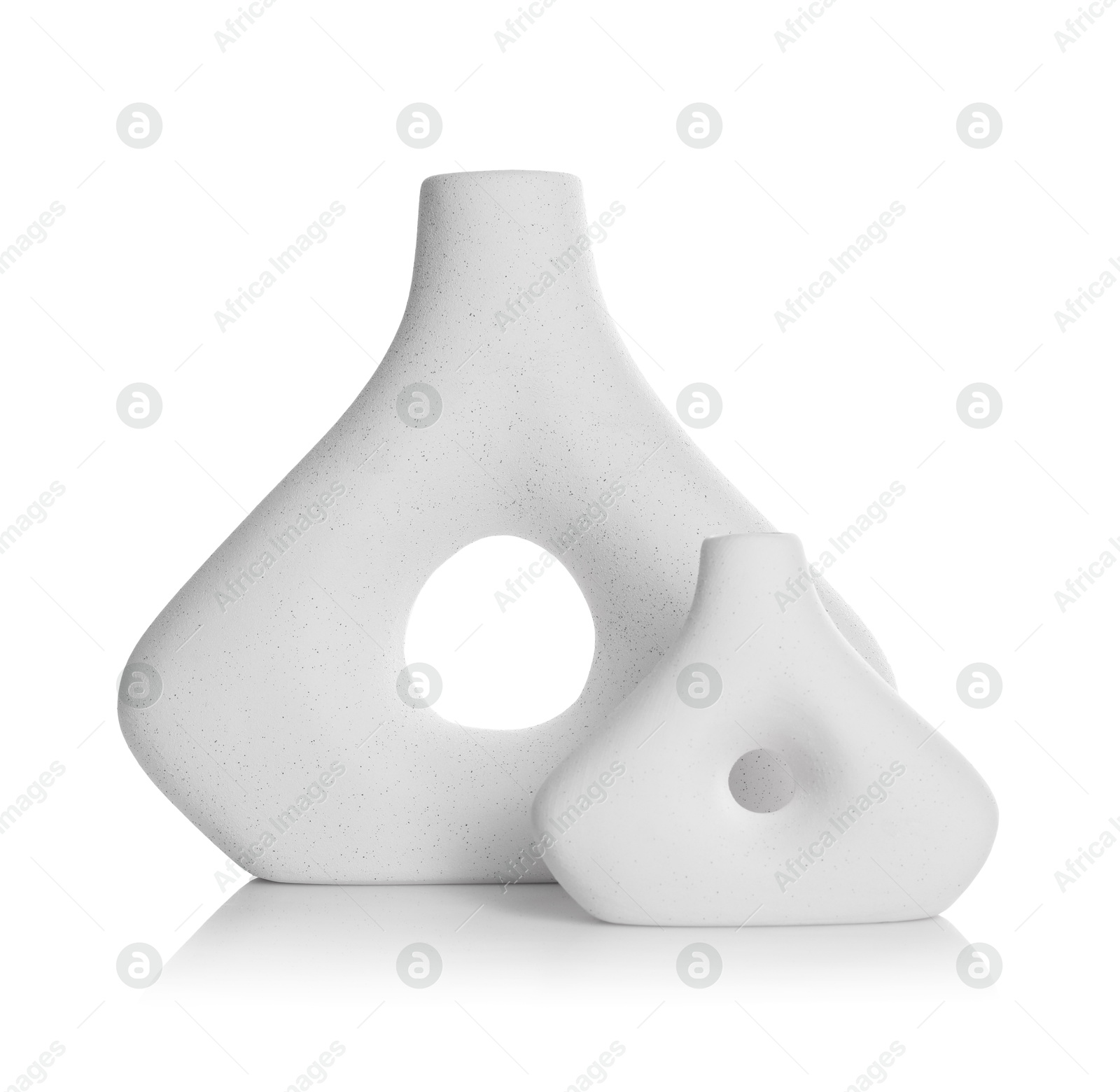 Photo of Two beautiful ceramic vases isolated on white