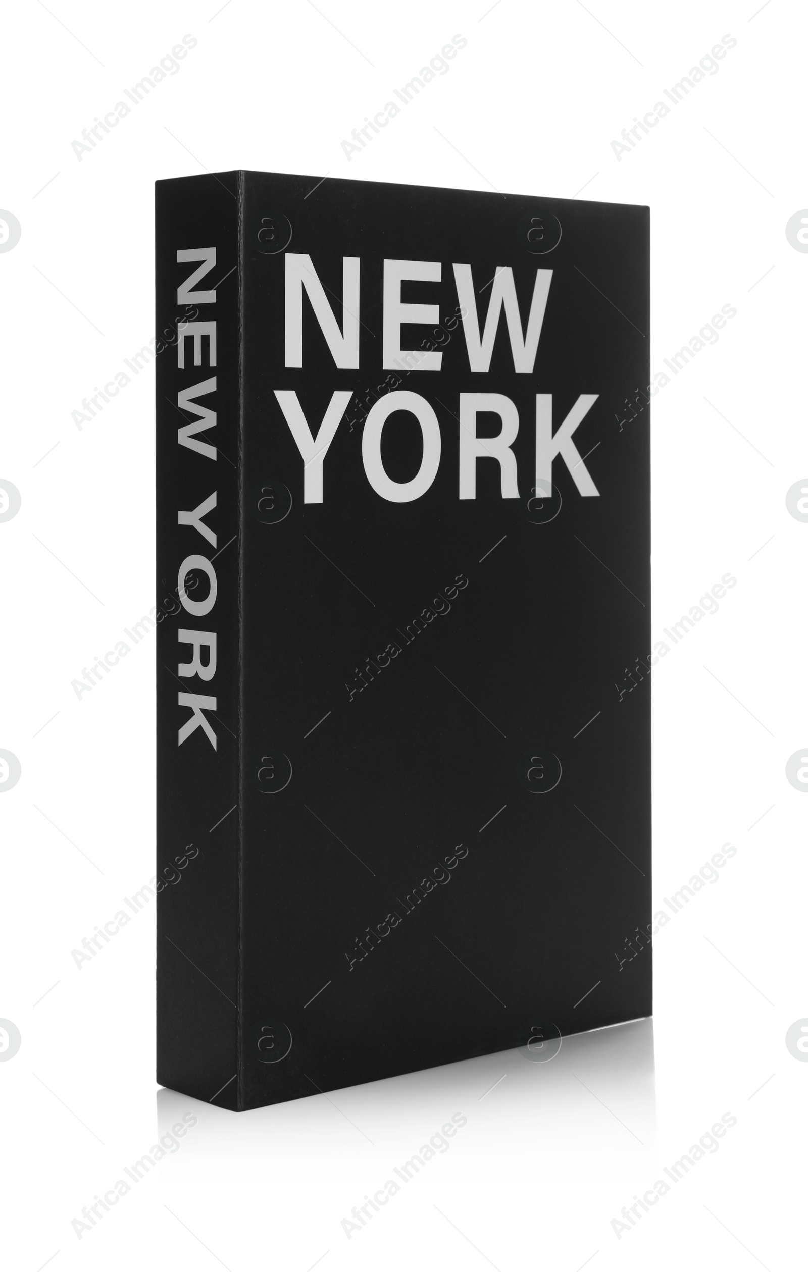 Photo of Book with words New York written on cover isolated on white