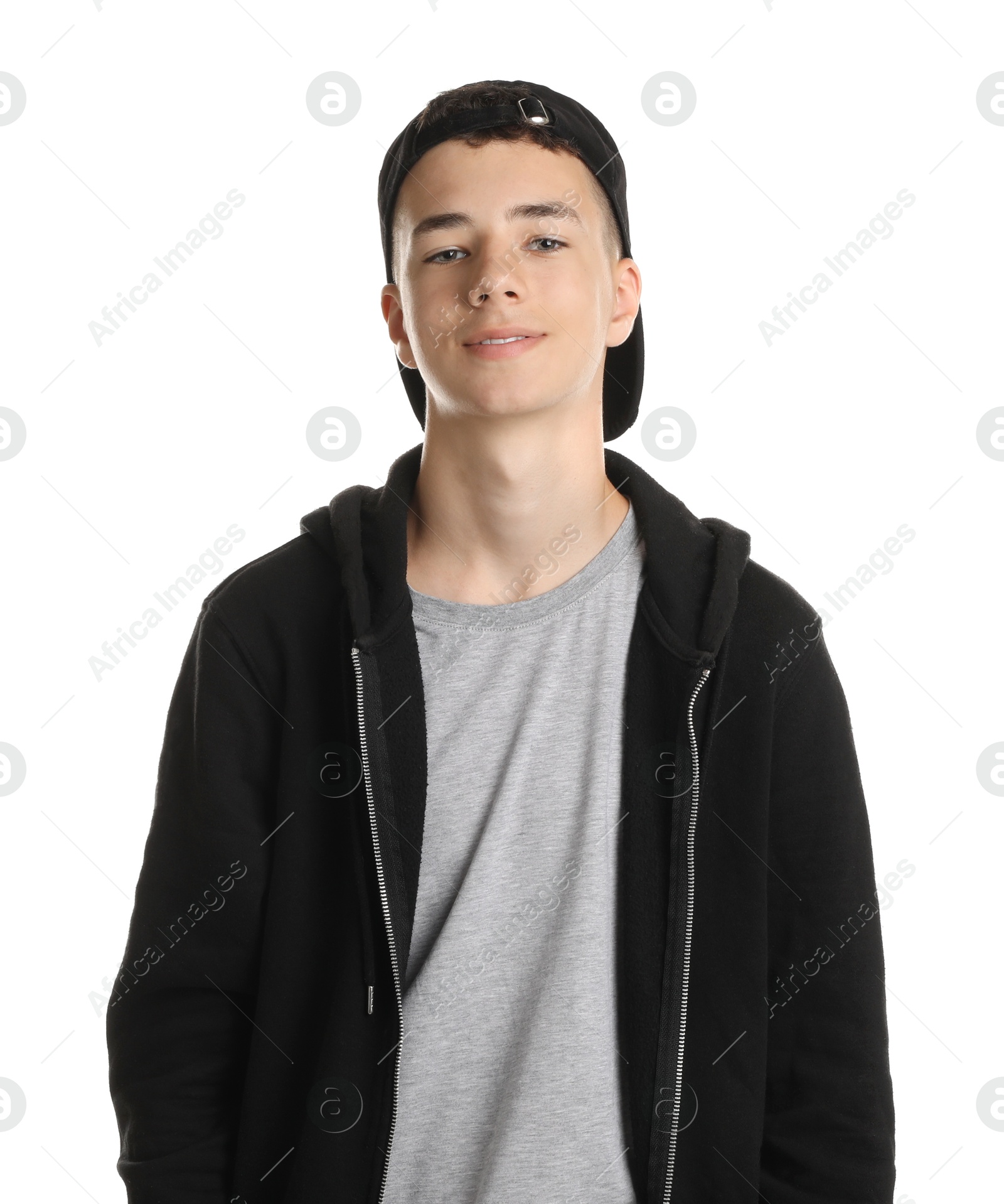 Photo of Portrait of teenage boy on white background