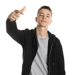 Photo of Portrait of teenage boy on white background