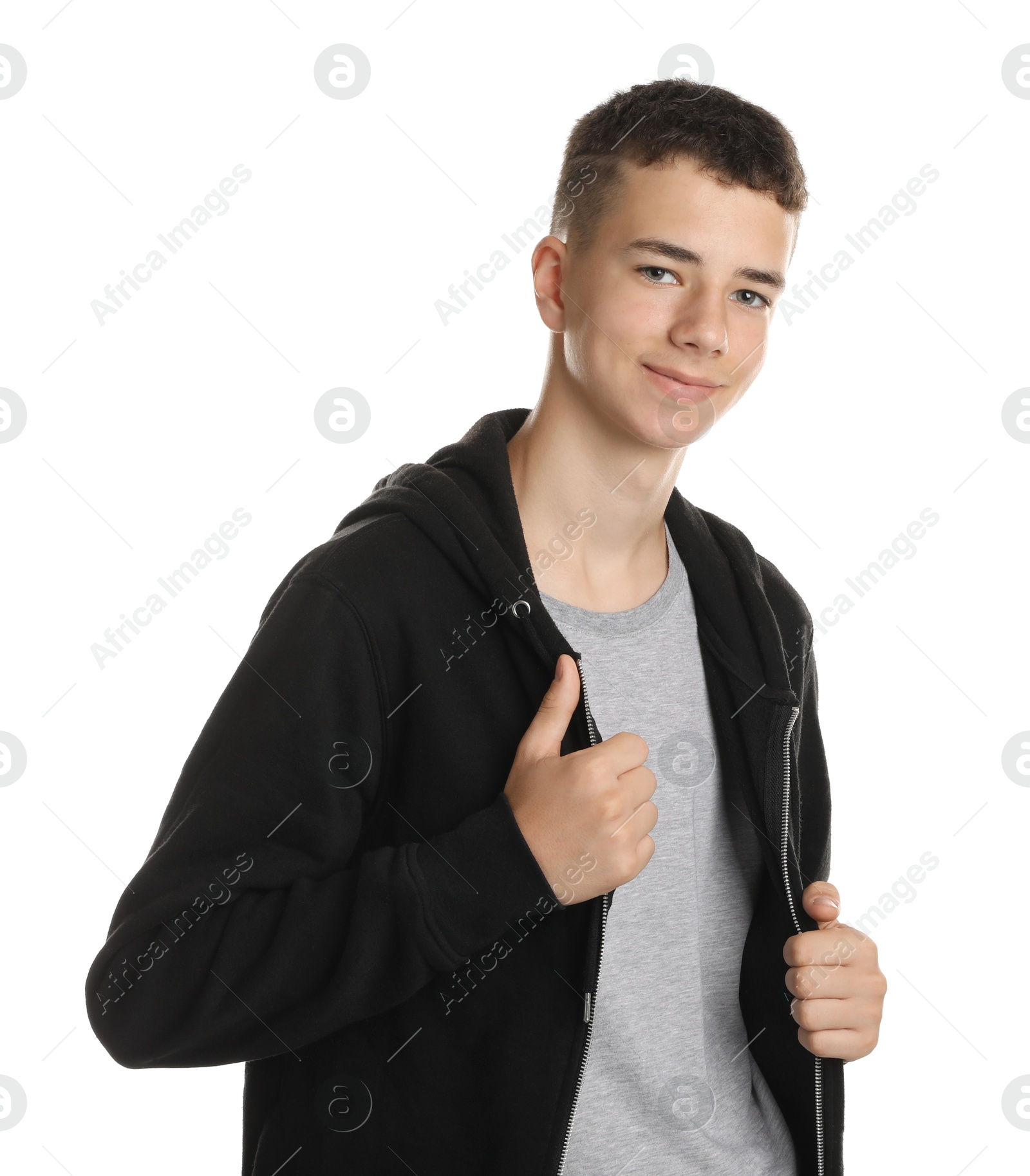 Photo of Portrait of teenage boy on white background