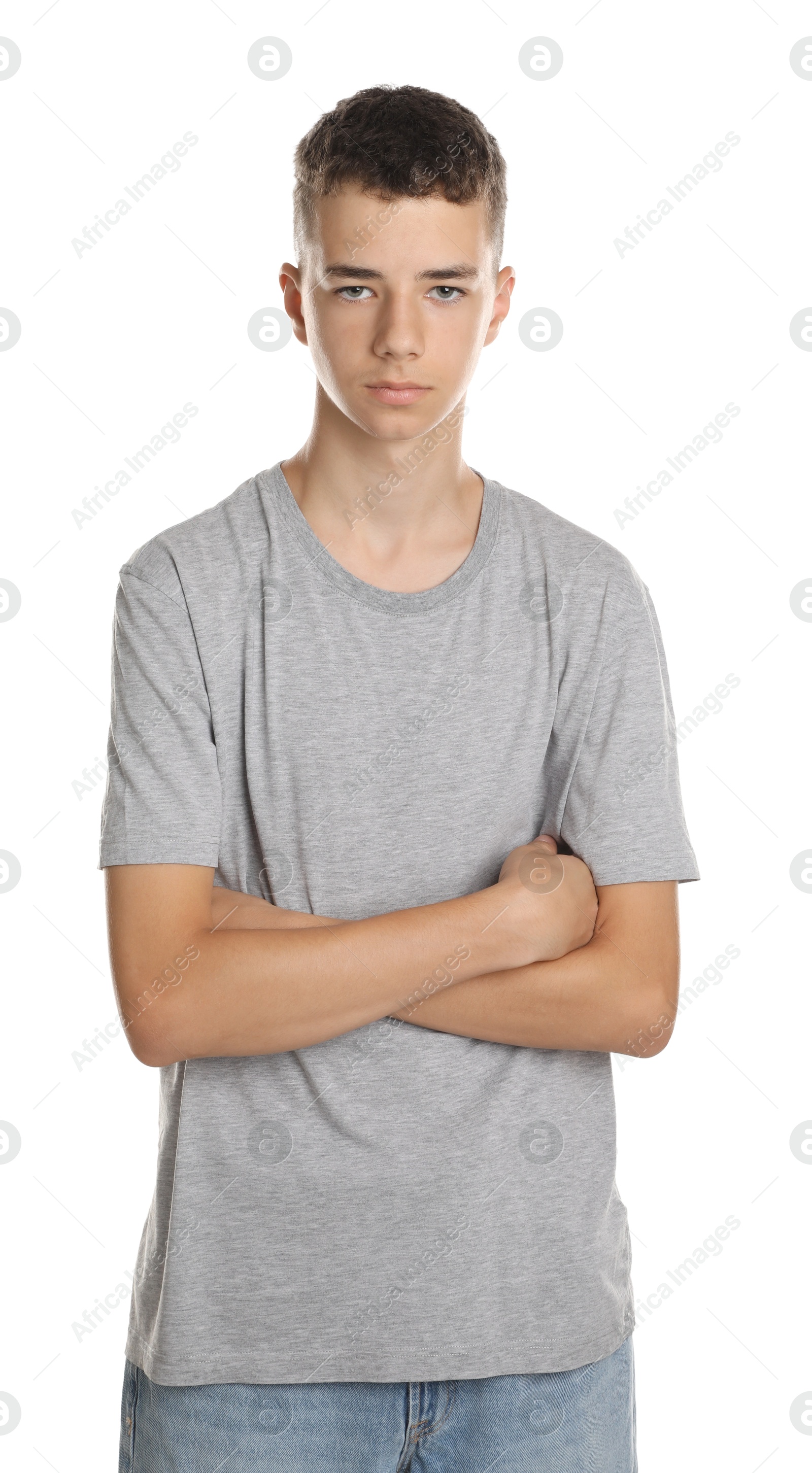 Photo of Portrait of teenage boy on white background