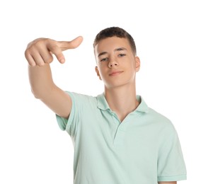 Photo of Portrait of teenage boy on white background