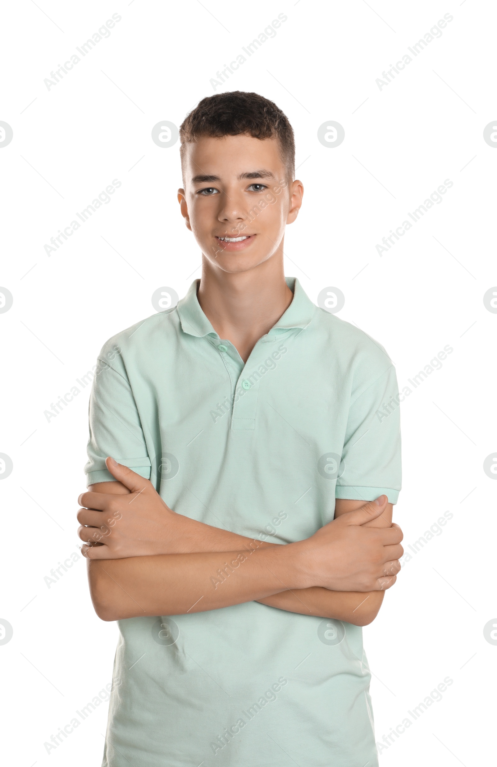 Photo of Portrait of teenage boy on white background