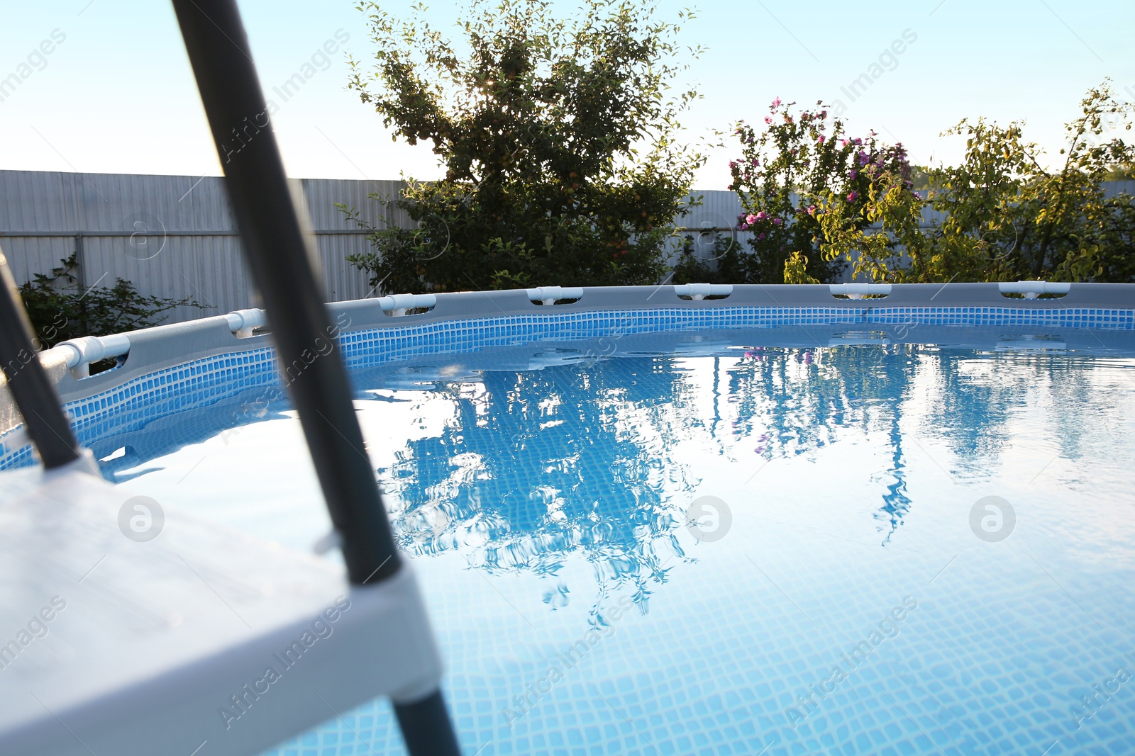 Photo of Above ground swimming pool outdoors on sunny day, closeup