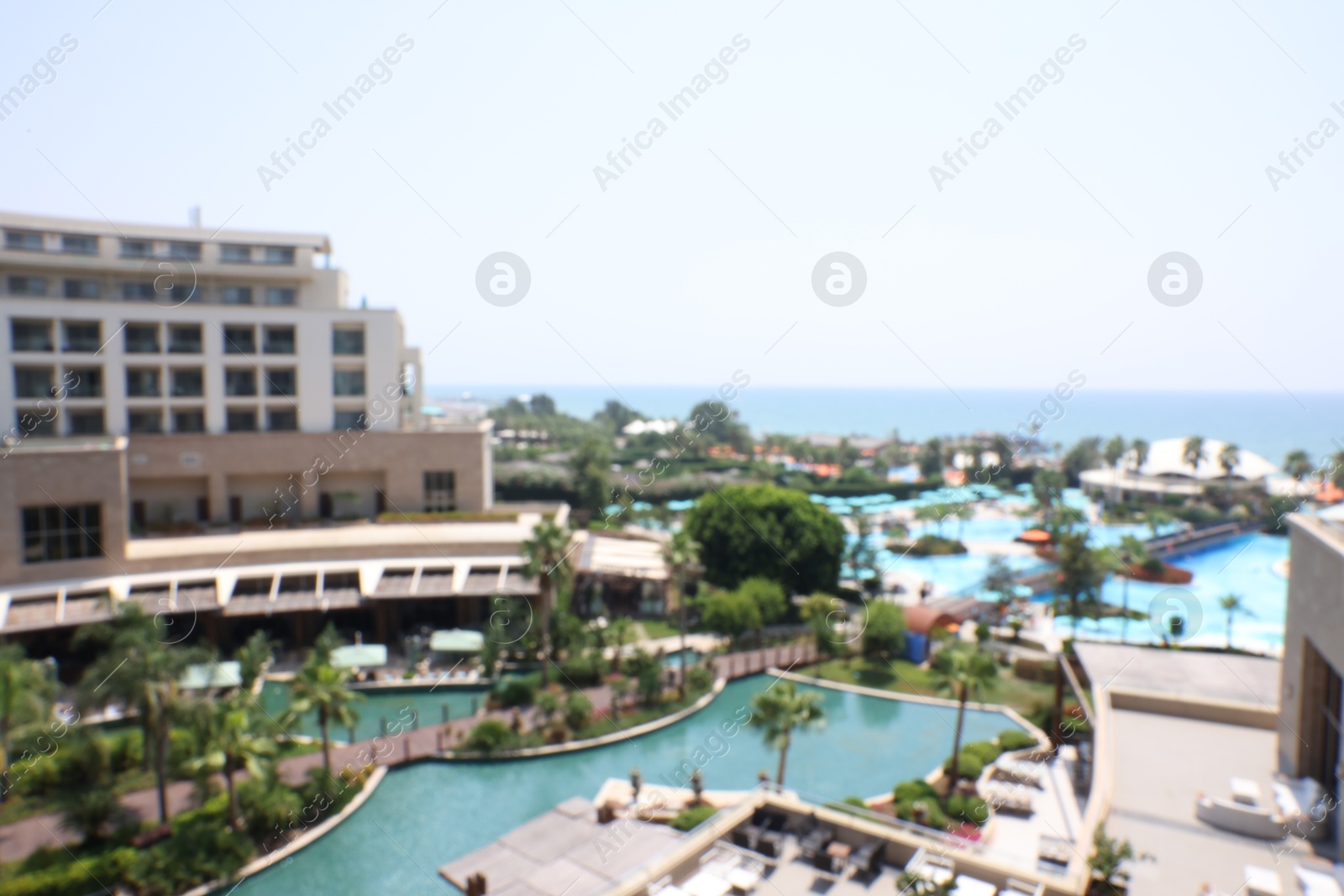 Photo of Blurred view of cityscape with luxury hotels and sea