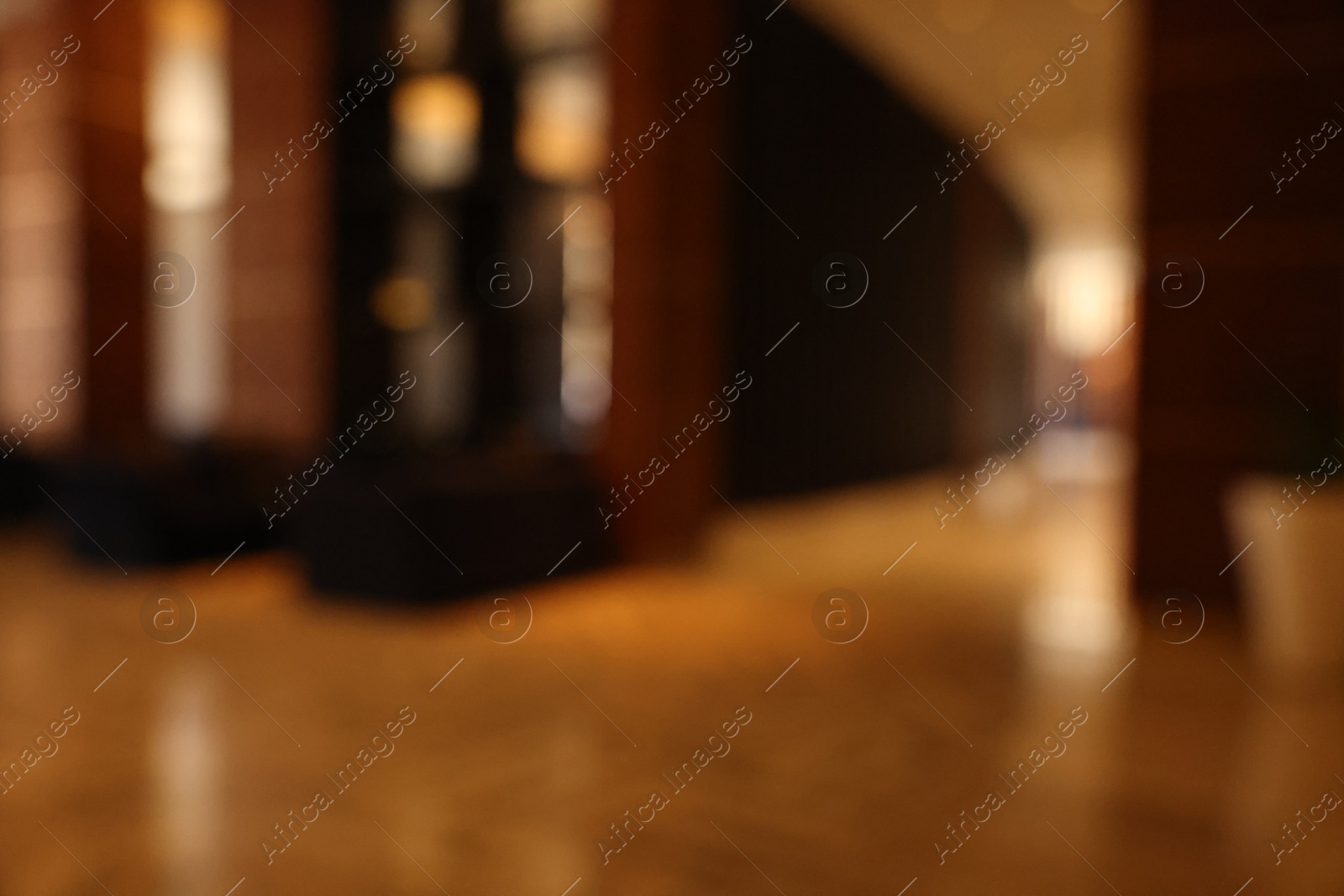 Photo of Blurred view of modern hotel lobby with comfortable furniture