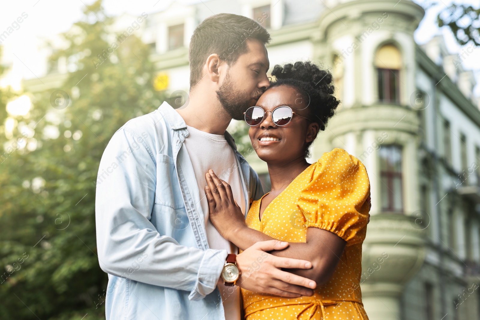 Photo of International relationships. Portrait of lovely couple outdoors