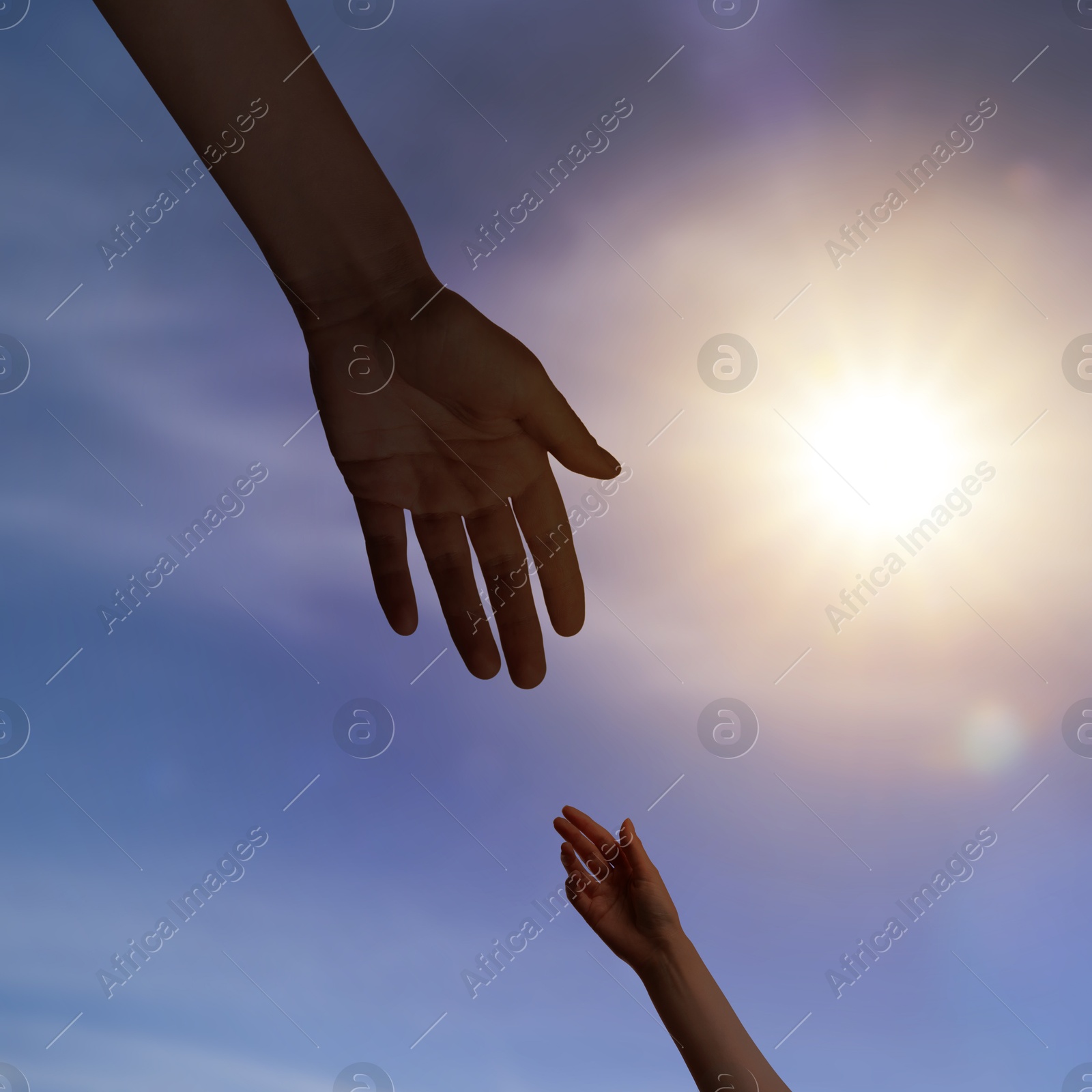 Image of God's help and support. Human reaching for hand from heaven