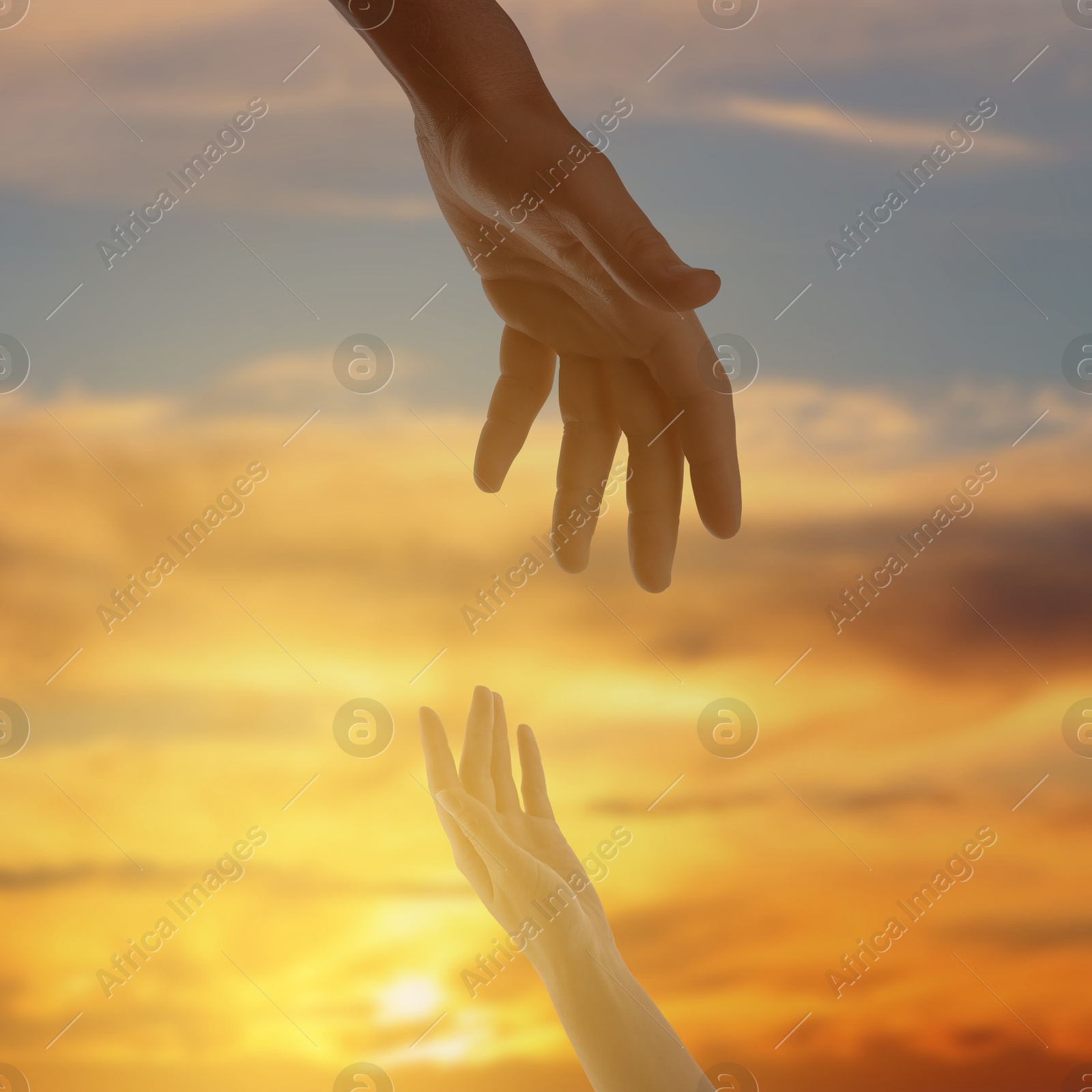 Image of God's help and support. Human reaching for hand from heaven