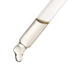 Photo of Essential oil dripping from pipette against white background