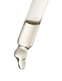 Photo of Essential oil dripping from pipette against white background