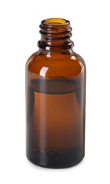 Photo of Essential oil in bottle isolated on white