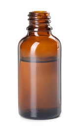 Photo of Essential oil in bottle isolated on white