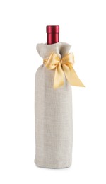 Wine bottle in burlap package with ribbon isolated on white