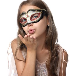 Cute girl wearing carnival mask and blowing kiss on white background