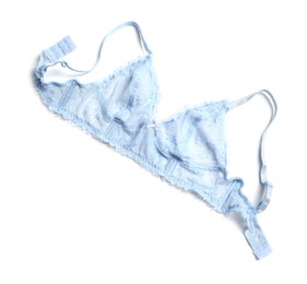 Photo of Elegant light blue lace women's underwear isolated on white, top view