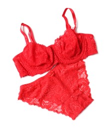 Photo of Elegant red lace women's underwear isolated on white, top view