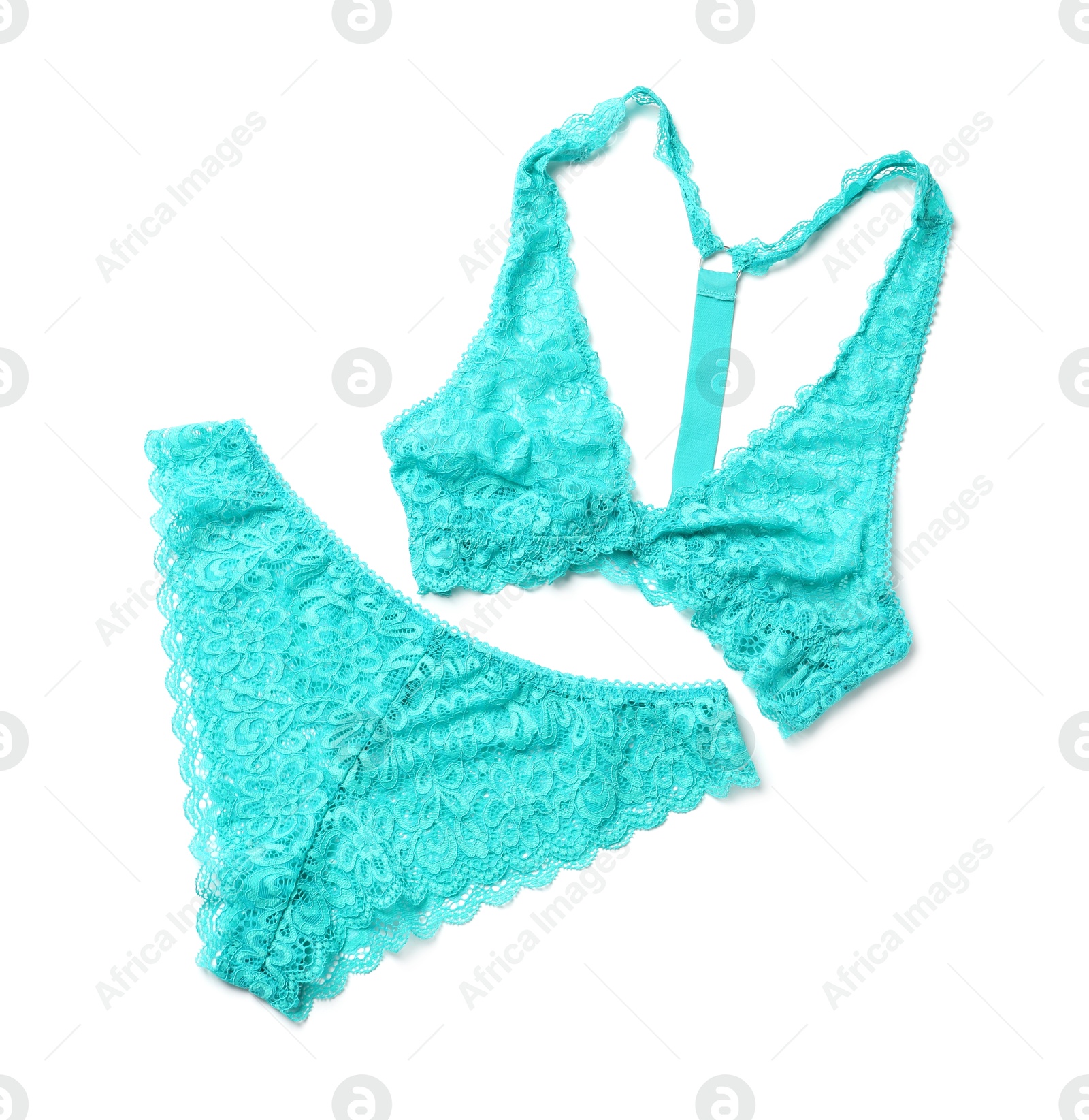 Photo of Elegant turquoise lace women's underwear on white background, top view