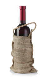 Photo of Wine bottle in burlap bag isolated on white