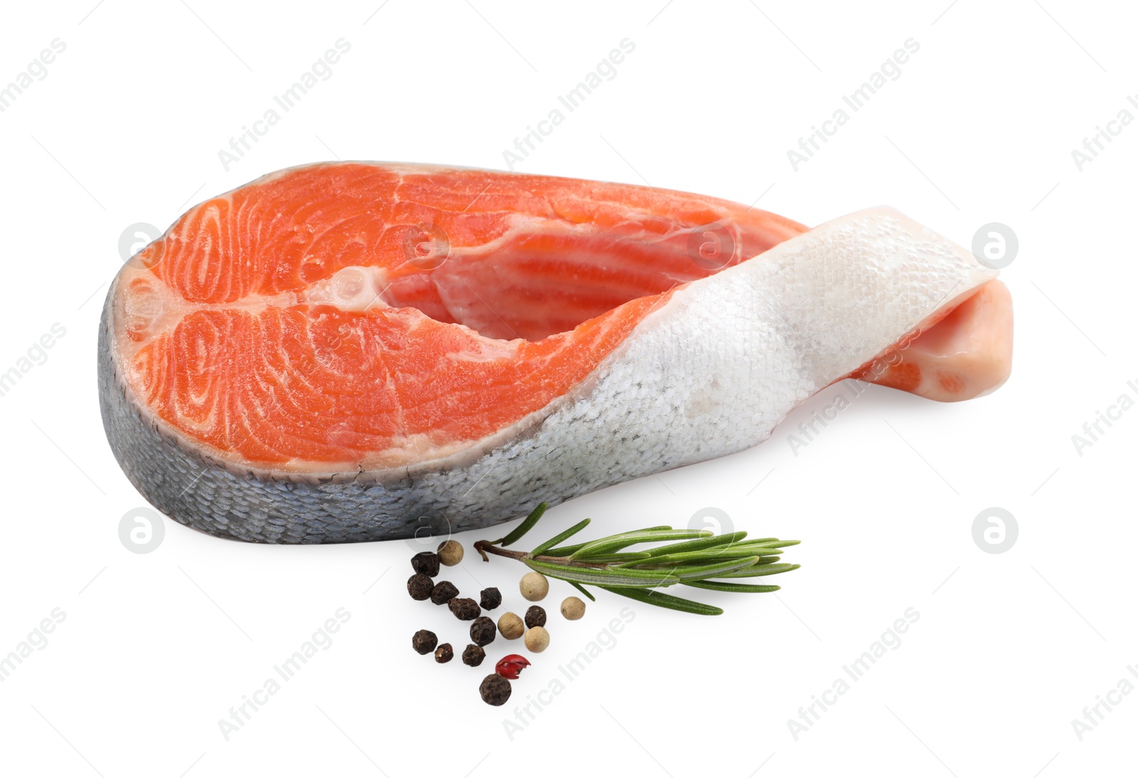 Photo of Fresh salmon steak, peppercorns and rosemary isolated on white