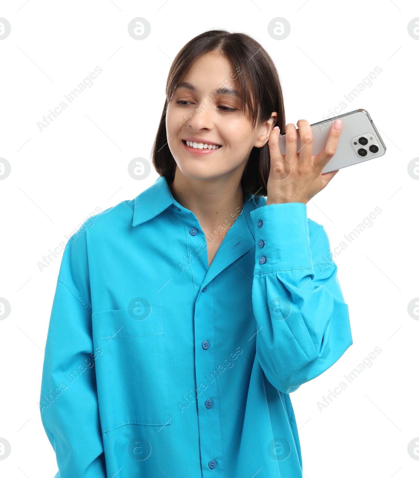 Photo of Beautiful woman with smartphone listening to voice message on white background