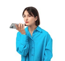 Photo of Beautiful woman recording voice message via smartphone on white background