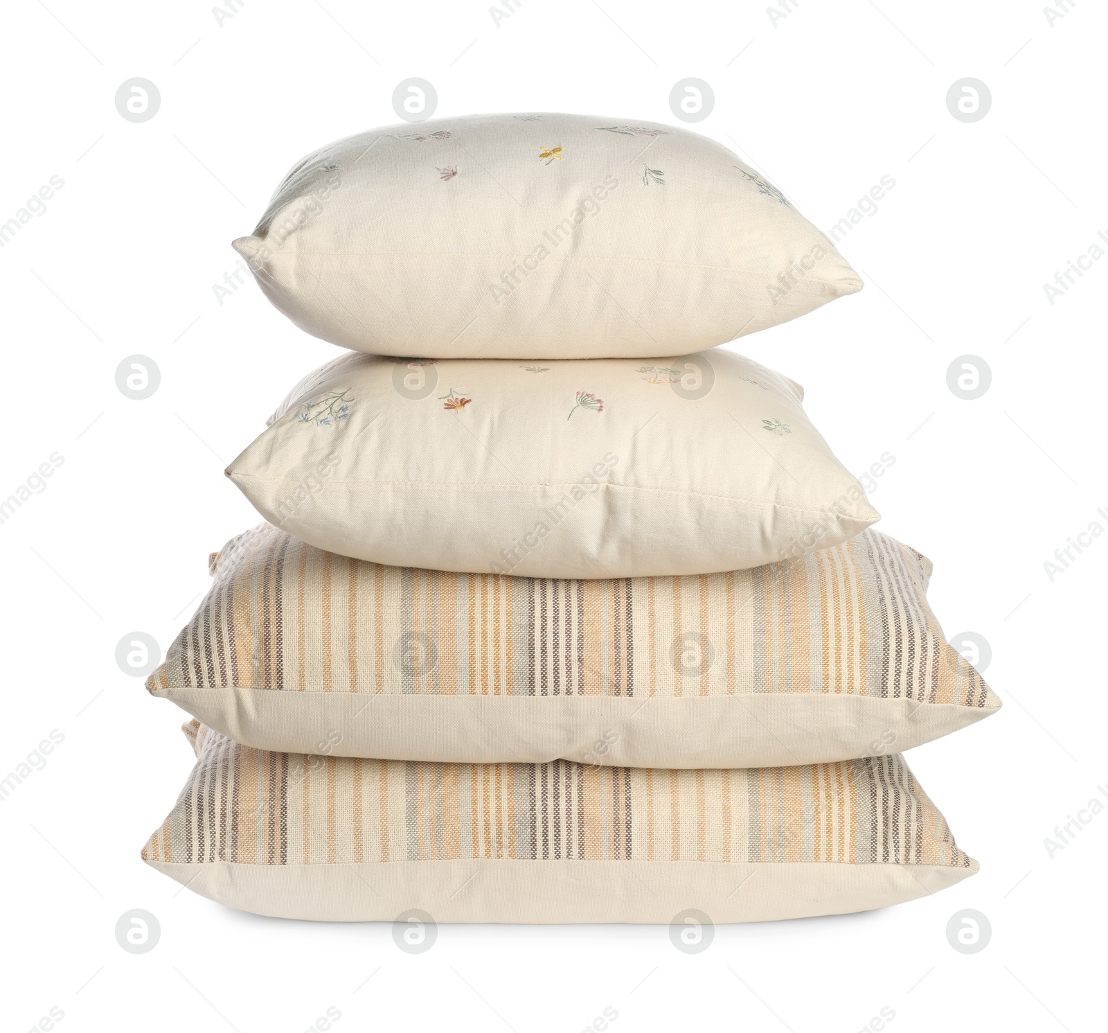 Photo of Stack of different pillows isolated on white