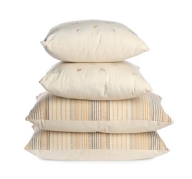 Photo of Stack of different pillows isolated on white