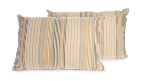 Photo of Two light striped pillows isolated on white