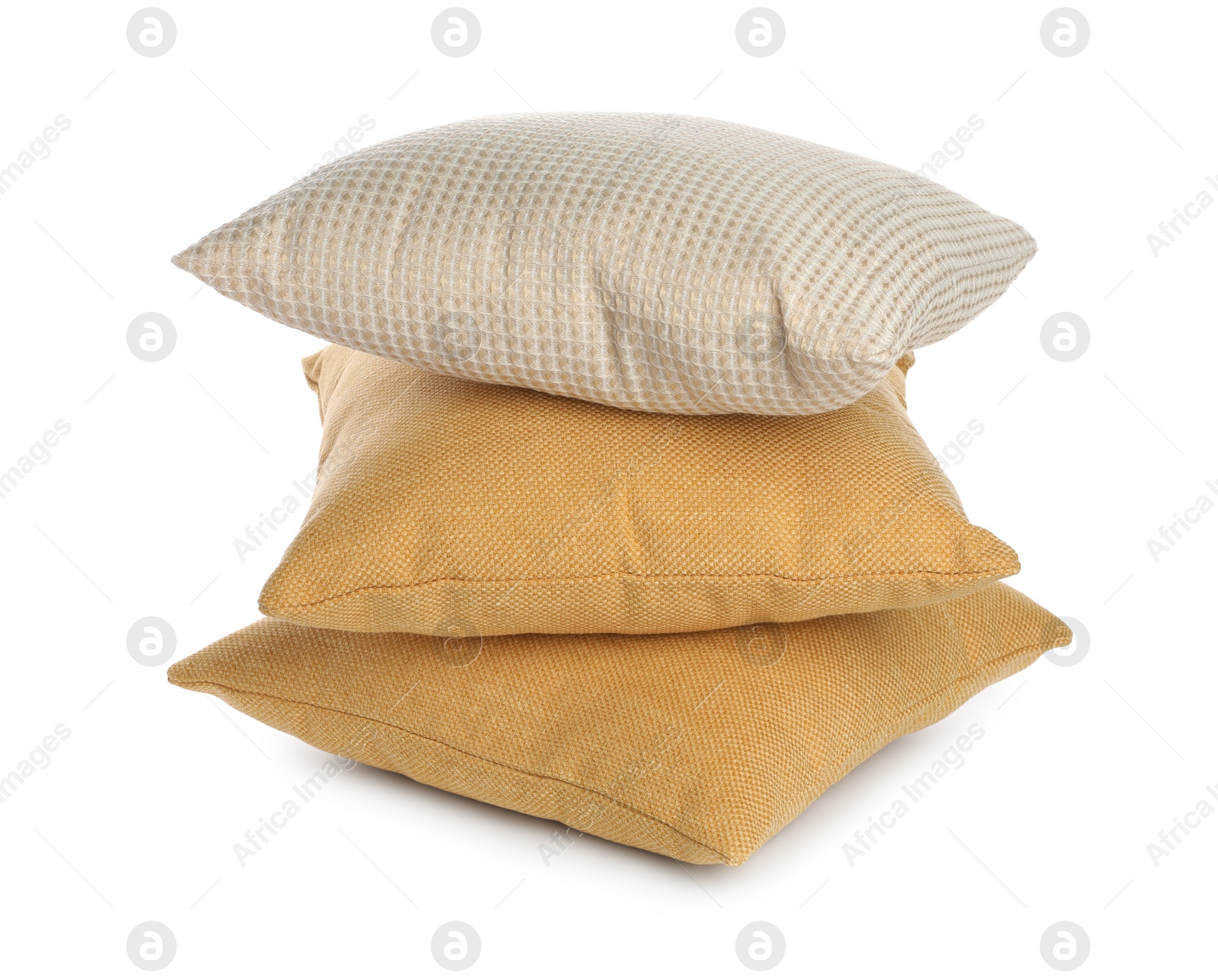 Photo of Stack of different pillows isolated on white