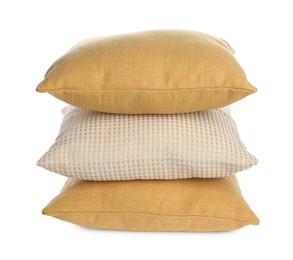 Photo of Stack of different pillows isolated on white