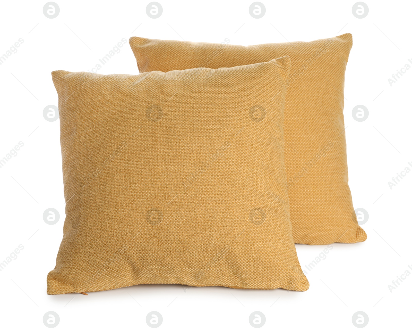 Photo of Two soft color pillows isolated on white