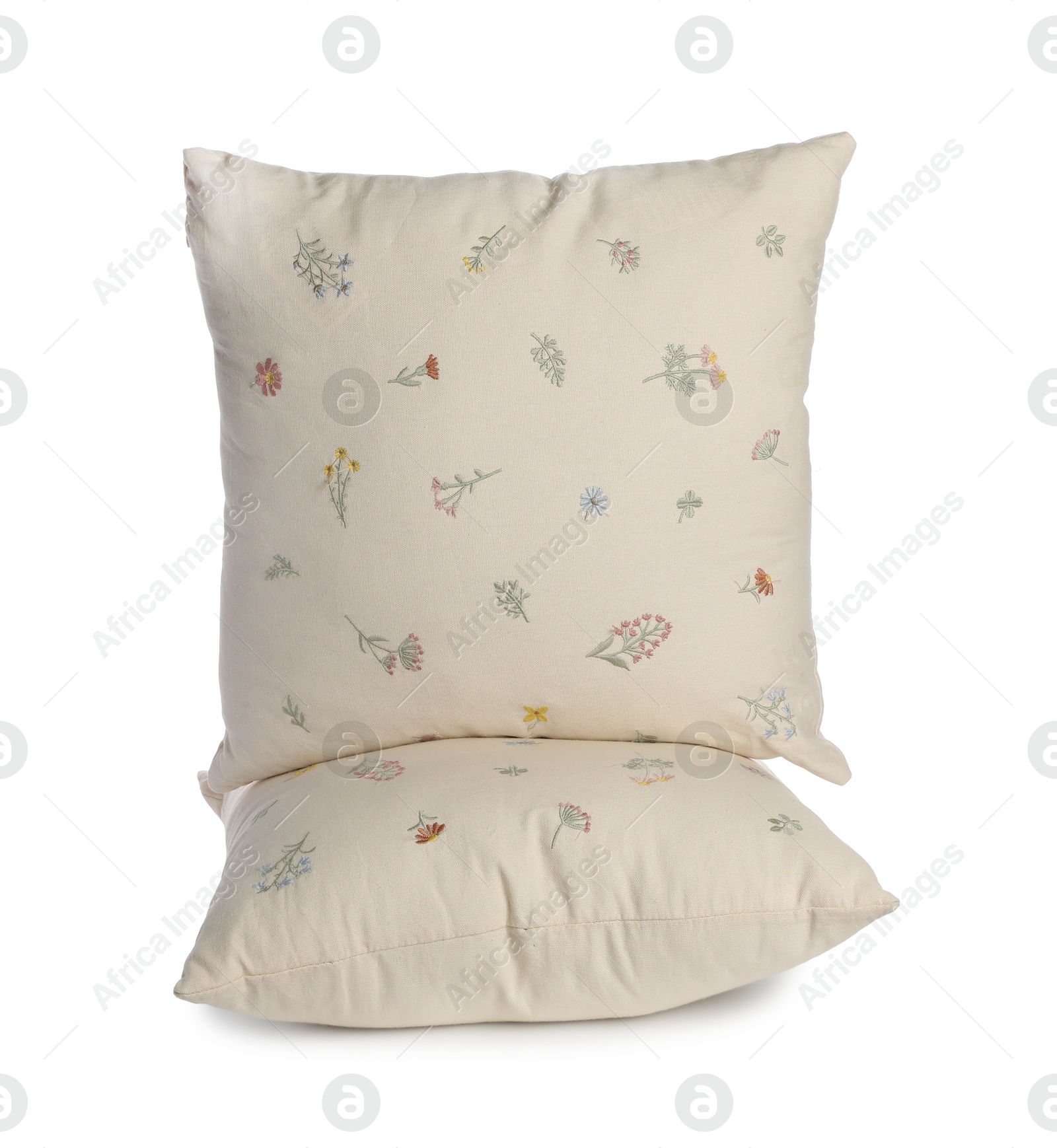 Photo of Two soft light pillows isolated on white